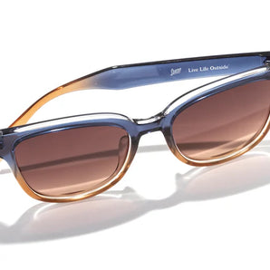 Miho by Sunski in blue and amber with nature-inspired lens colors, lightweight sunglasses with curved lines for beach and brunch wear