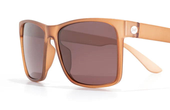Puerto by Sunski in matte tan with square sport frame, polarized lenses, superlight recycled material, comfortable for all-day sun protection