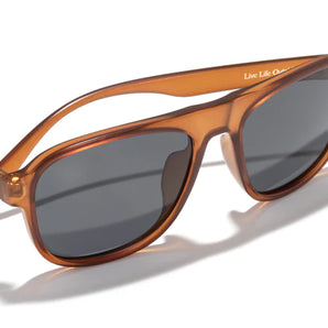 Shoreline by Sunski in amber brown with square aviator frame, retro style sunglasses for men and women with large coverage for adventure