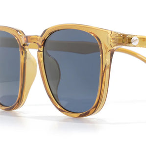 Tango by Sunski in translucent amber frame with polarized Helio lenses, SuperLight recycled sunglasses for men and women outdoor use
