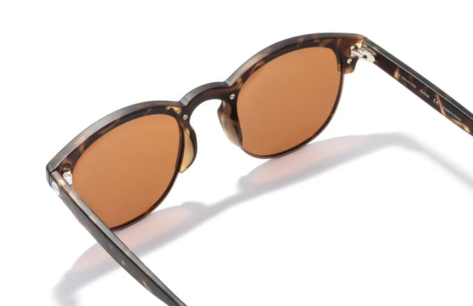 Avila by Sunski in tortoise with brown lenses, classic half frame glasses with metal details and lightweight design for men and women