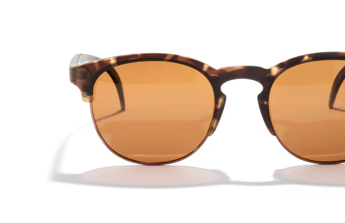 Avila by Sunski in tortoise with amber lenses, classic half frame sunglasses, lightweight and versatile with metal details for daily wear