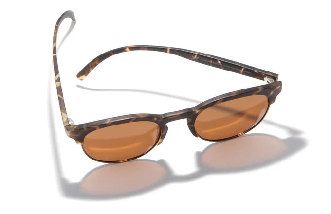 Avila by Sunski in tortoise shell with orange lenses, lightweight half frame glasses with metal details and no wire nose pads for everyday wear
