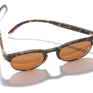 Avila by Sunski in tortoise shell with orange lenses, lightweight half frame glasses with metal details and no wire nose pads for everyday wear