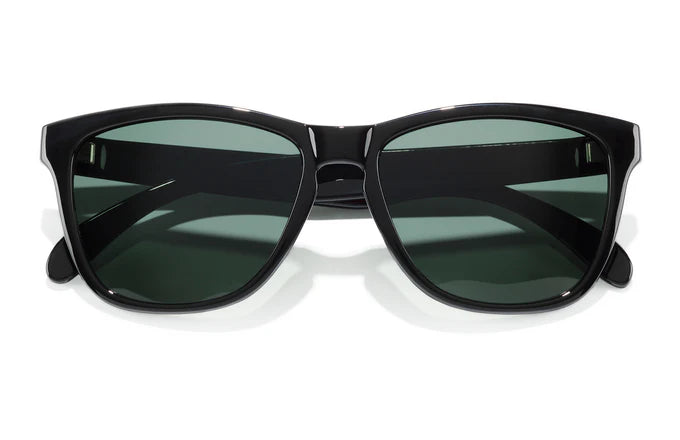Headland by Sunski in black with green lenses, medium rectangular wayfarer sunglasses for men and women, stylish outdoor accessory