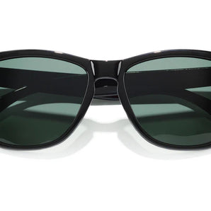 Headland by Sunski in black with green lenses, medium rectangular wayfarer sunglasses for men and women, stylish outdoor accessory