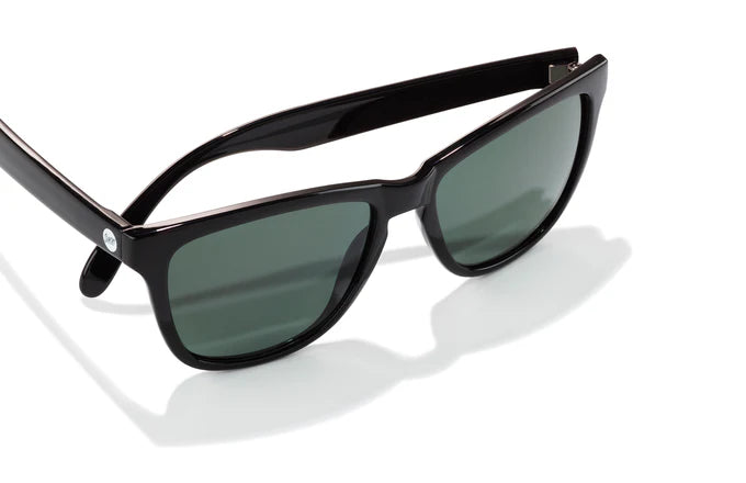 Headland by Sunski in black with green lenses, medium rectangular wayfarer sunglasses for men and women, USA-based accessory