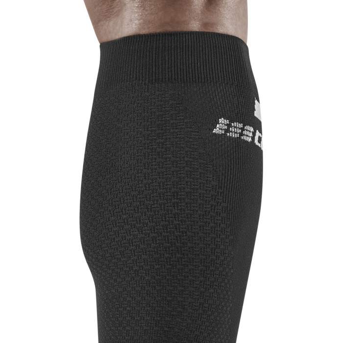 Run Compression Socks Tall - Men by CEP Sports in black, targeted medi compression reducing muscle vibrations for running performance