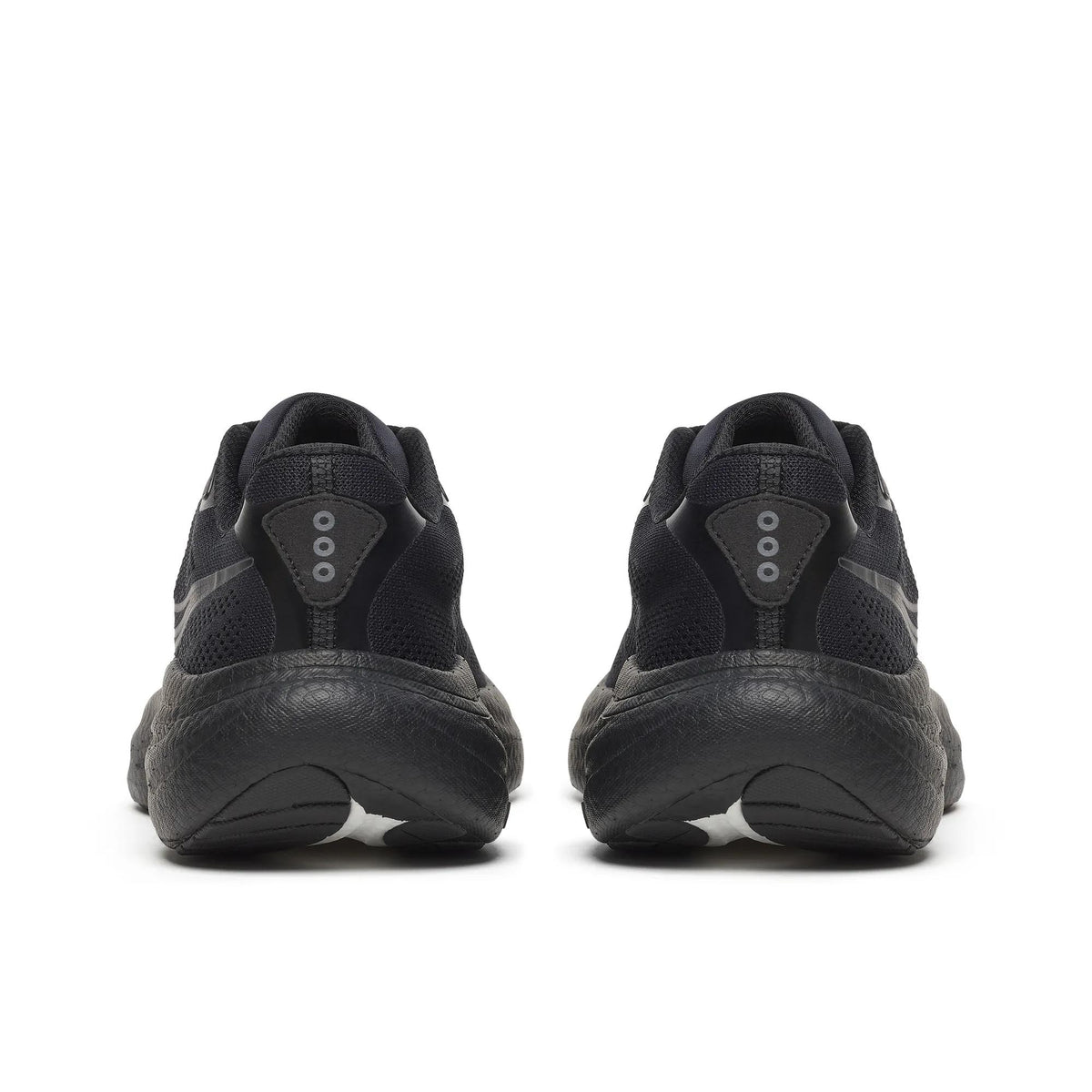 Back view of a pair of Saucony Ride 19 Wide women's road running shoes in Triple Black
