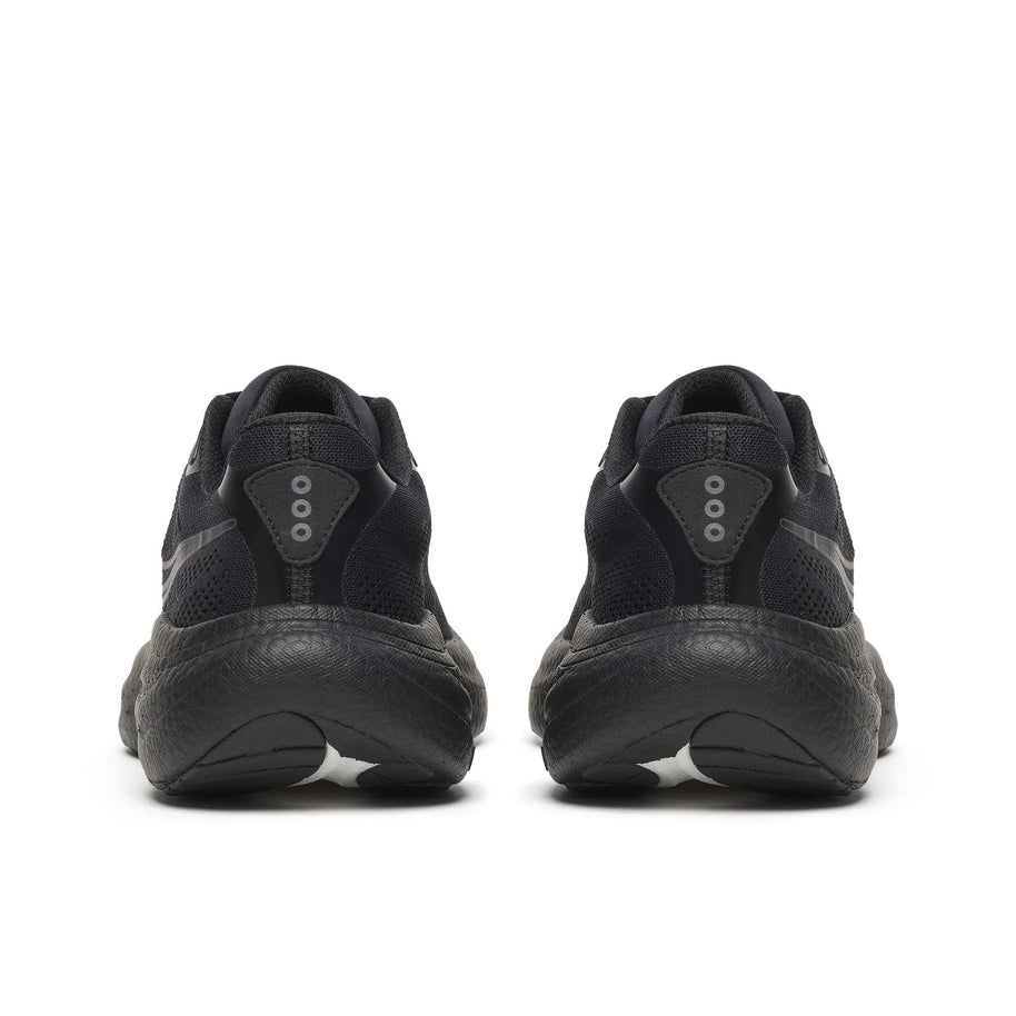 Back view of a pair of Saucony Ride 19 Wide women's road running shoes in Triple Black