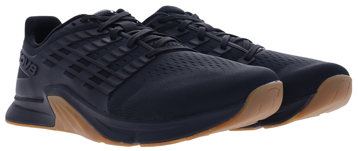 Pair of Inov8 F-Lite Wide women's training shoes in Black/Gum, front three-quarter view of black uppers