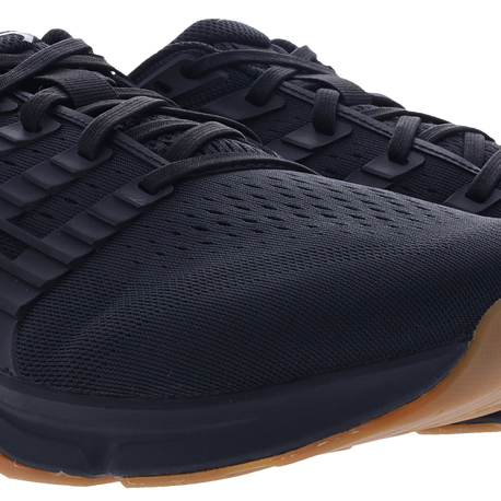 Pair of Inov8 F-Lite Wide women's training shoes in Black/Gum, front three-quarter view of black uppers