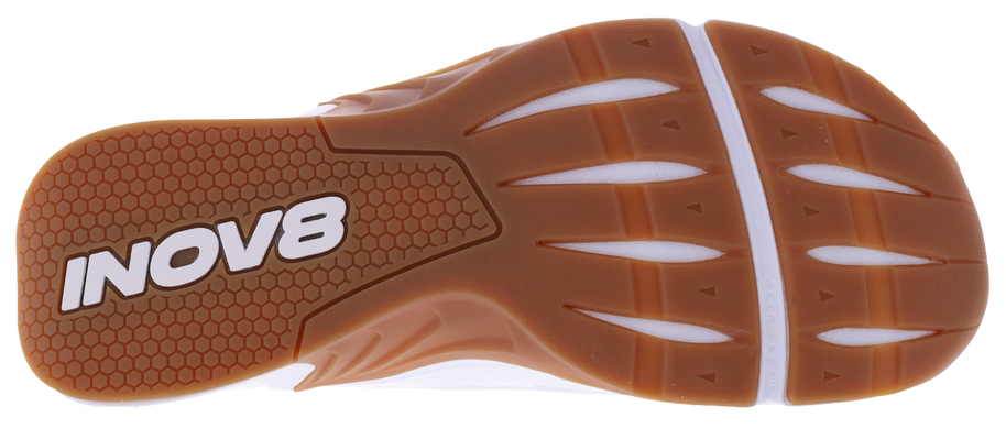 Outsole of the Inov8 F-Lite Wide women's training shoe in White/Gum, gum rubber with white Inov8 logo