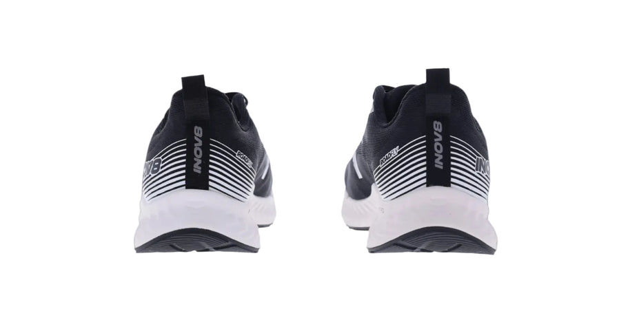 Pair of Inov8 RoadFly men's road running shoes in black and white, back view of heels with pull tabs