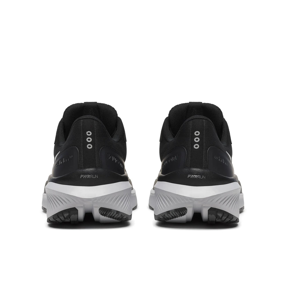 Pair of Saucony Echelon 10 X Wide men's road running shoes in Black/Silver, back heel view with white midsoles