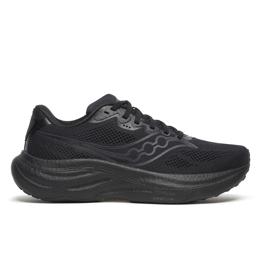 Saucony Ride 19 Wide women's road running shoe in Triple Black, side view of all-black upper and midsole