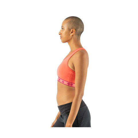 Utili Bra-Vo by Rabbit in coral and pink, multifunctional sports bra with laser-cut pocket, minimizes bounce for confident running and training