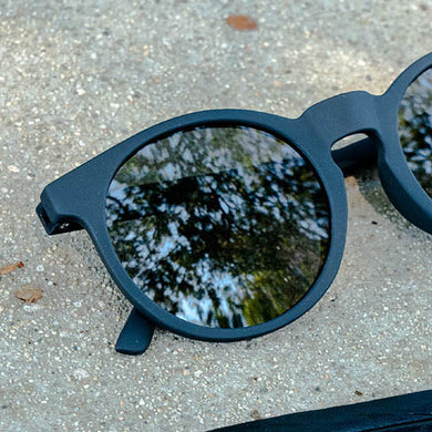 It's Not Black, It's Obsidian by Goodr, obsidian-colored glasses with reflective lenses, durable and stylish eyewear from USA-based brand