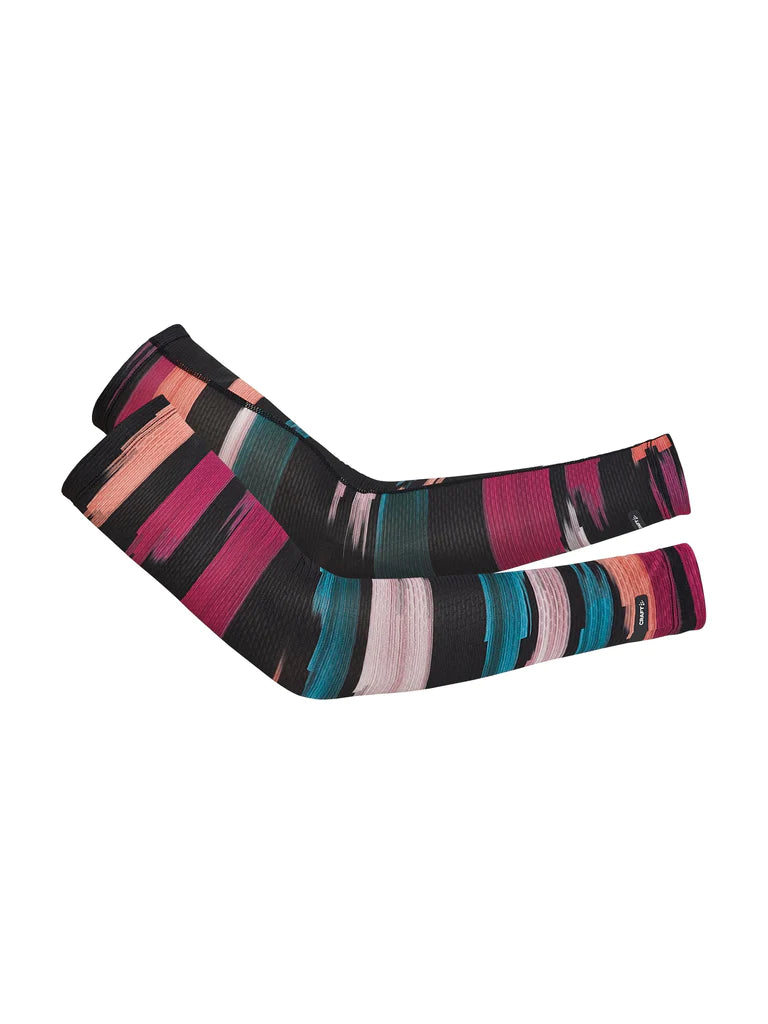 Vent Mesh Arm Cover by Craft in black with pink and teal stripes, breathable sleeves for warmth during early running stages