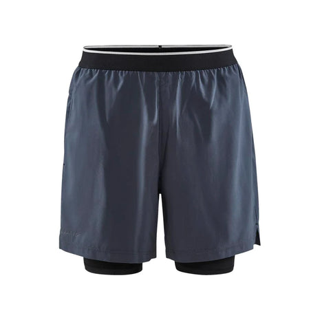 ADV Essence Perforated 2-in-1 Shorts - Men (7") by Craft in dark grey with black tights, lightweight stretch training shorts ideal for running