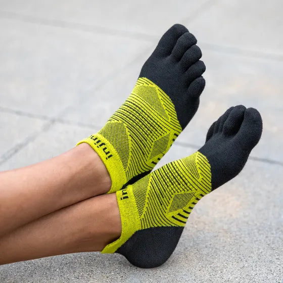 Injinji Run Lightweight No-Show - Unisex yellow and black five-toe socks designed for running, reducing friction and preventing blisters