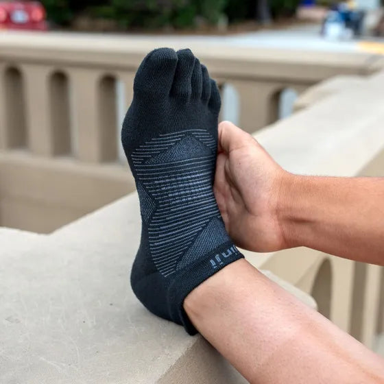 Injinji Run Lightweight No-Show - Unisex black five-toe running sock designed for blister prevention and low bulk on all surfaces in Canada