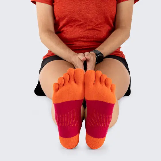 Run Lightweight No-Show - Women by Injinji in orange and red, low-bulk socks designed for running with stretch and narrow fit
