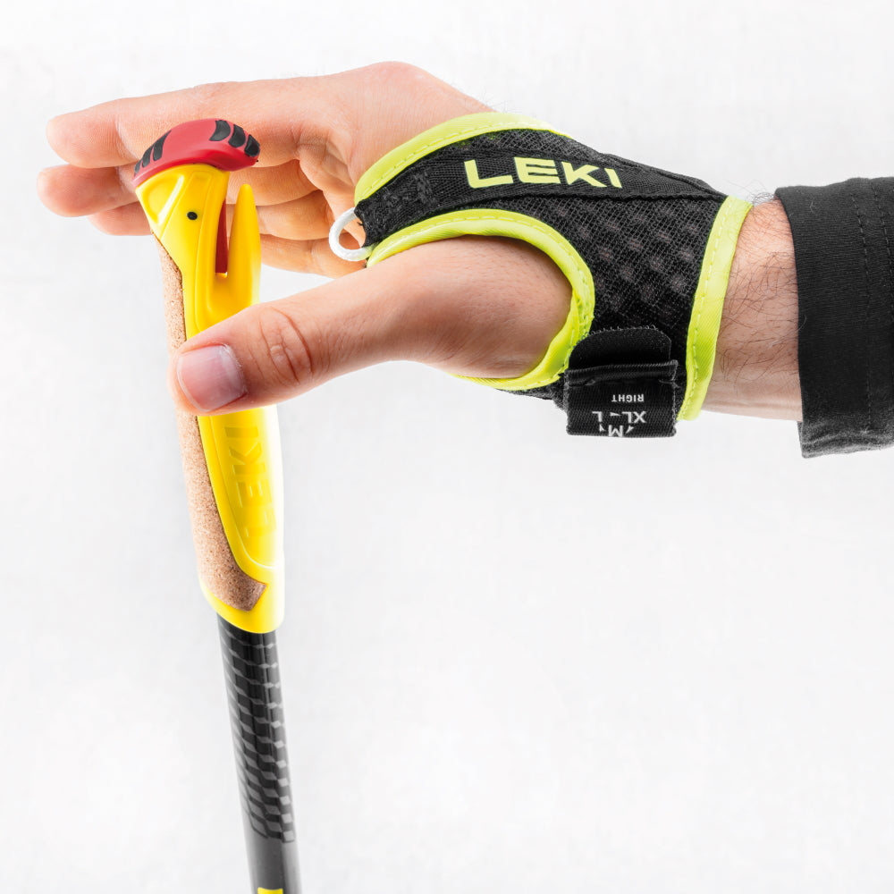 Evotrail FX ONE TA by Leki in yellow with cork grip and adjustable strap, stable aluminium trail running pole for rugged outdoor use