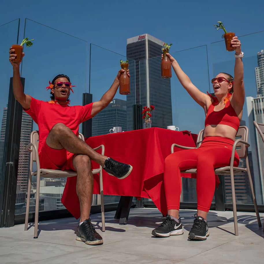 Phoenix At A Bloody Mary Bar by Goodr, red frames with rose lenses, stylish glasses ideal for outdoor social events and vibrant city life