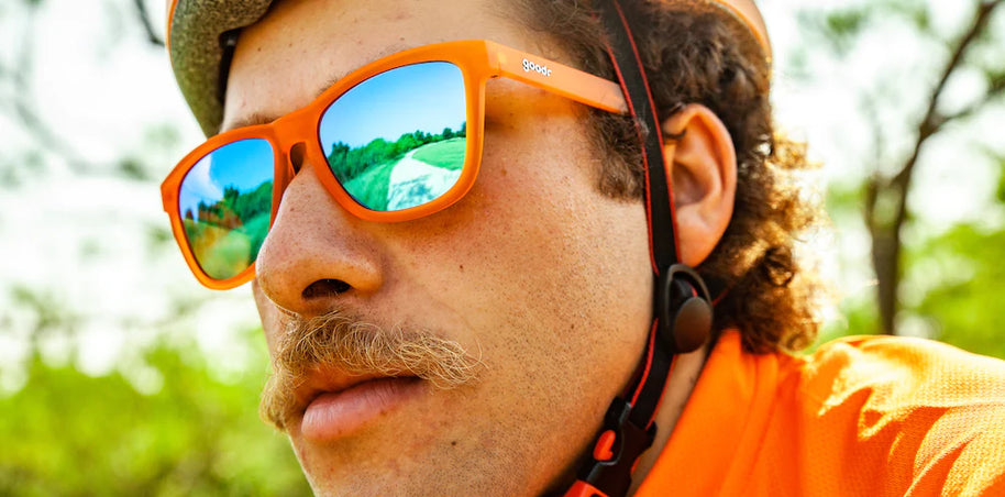 Donkey Goggles by Goodr in bright orange with reflective lenses, lightweight glasses for speed, agility, and outdoor use