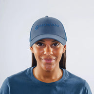Basecamp Cap Unisex by Montane in blue cotton canvas with mesh back, rear hook and loop adjustment, COOLMAX headband for outdoor comfort