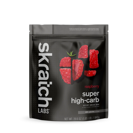 Super High-Carb Sport Drink Mix raspberry by Skratch Labs in black pouch, high-calorie nutrition for athletes needing fast energy fueling.
