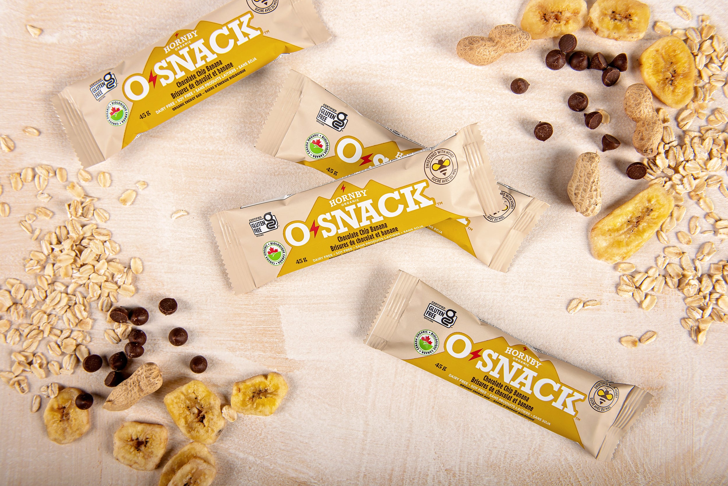 OSnack Chocolate Chip Banana by Hornby Organic in beige wrapper with peanut butter, banana, cinnamon, and dark chocolate chips, nutritious snack