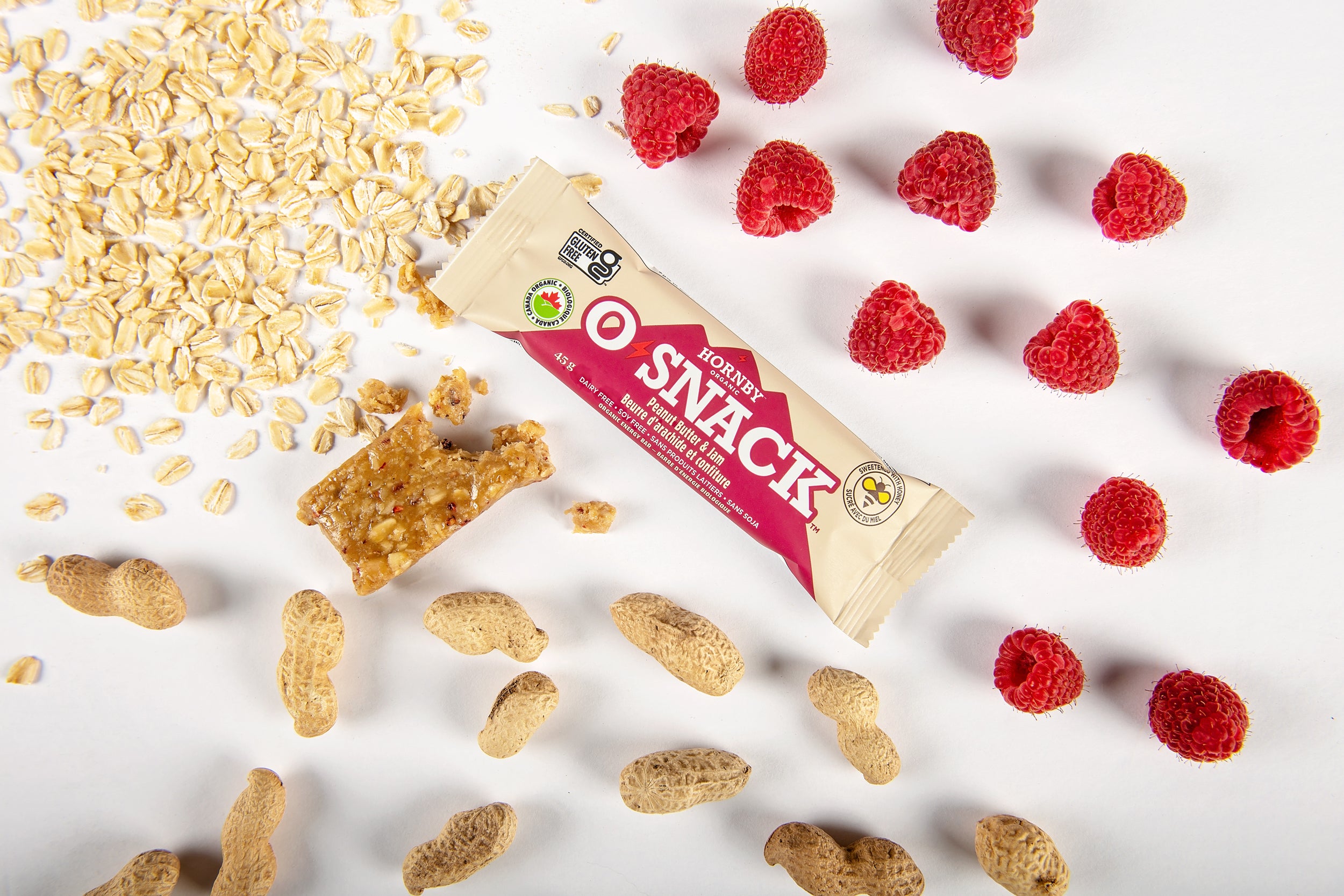 OSnack Peanut Butter & Jam by Hornby Organic in beige and red wrapper, organic snack with raspberry and peanut flavor from Canada