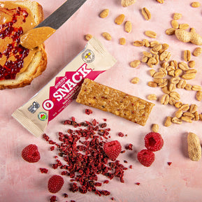 OSnack Peanut Butter & Jam by Hornby Organic in red and beige with organic peanut and raspberry flavour snack bar for nutrition and energy