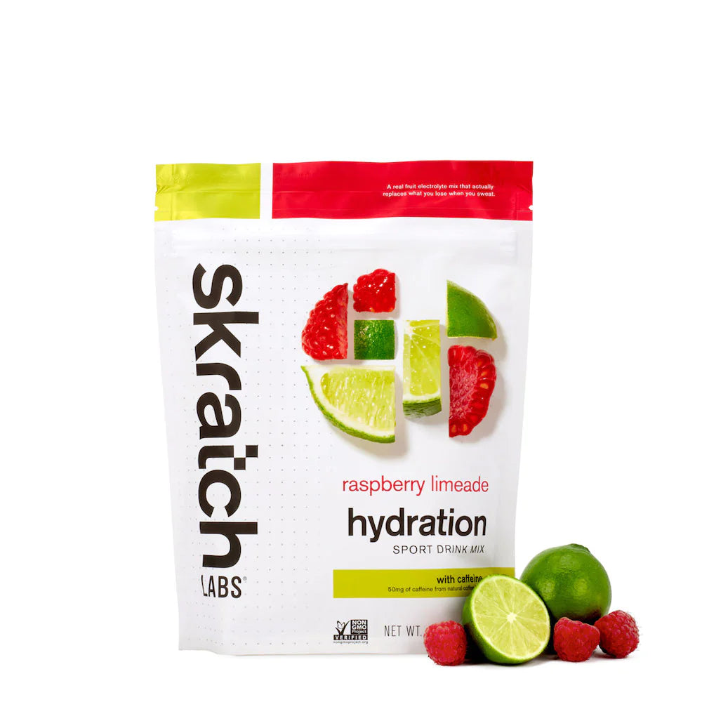 Sport Hydration Drink Mix raspberry limeade by Skratch Labs in white and red pouch with natural electrolytes and caffeine for workout energy