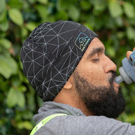 HyperNight Reflective Beanie by Nathan in black with reflective pattern, lightweight polyester stretch fabric for running day to night.