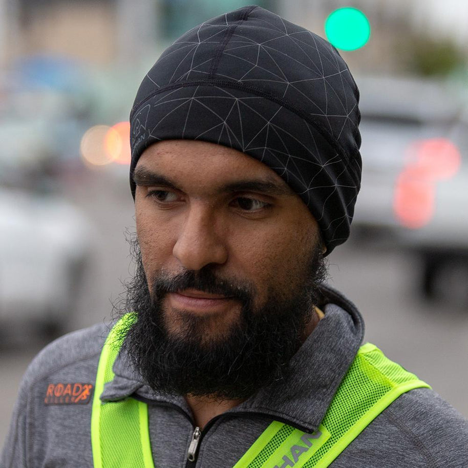 HyperNight Reflective Beanie by Nathan in black with reflective pattern, lightweight polyester/spandex knit for night running comfort and visibility