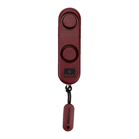 SaferRun Ripcord Siren Personal Alarm by Nathan in dark red, compact safety device with 120dB alarm for emergency alerts during running and outdoor use
