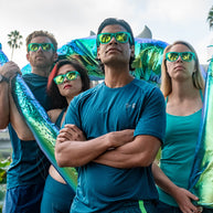 Nessy's Midnight Orgy by Goodr in teal, reflective sunglasses with Loch Ness Monster skin-inspired design for running and outdoor use