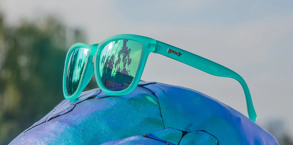 Nessy's Midnight Orgy by Goodr in teal, lightweight glasses with skin-on-skin comfort and bold Loch Ness Monster inspired design