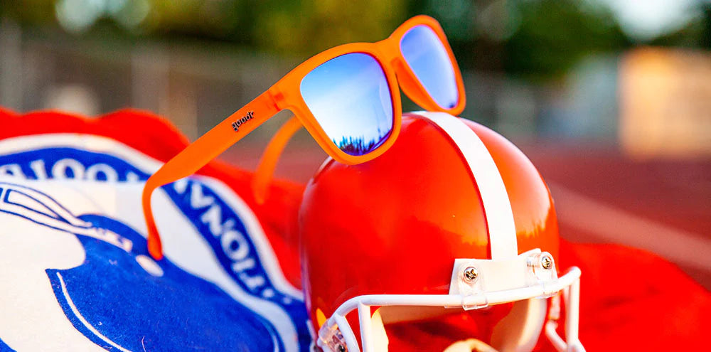 Donkey Goggles by Goodr in bright orange with blue mirrored lenses, lightweight glasses for speed, agility, and outdoor sports