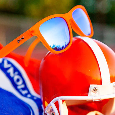 Donkey Goggles by Goodr in bright orange with blue mirrored lenses, lightweight glasses for speed, agility, and outdoor sports