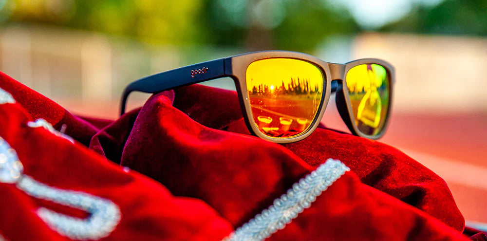 Whiskey Shots With Satan by Goodr in black and yellow reflective lenses, stylish lightweight glasses ideal for outdoor and running enthusiasts