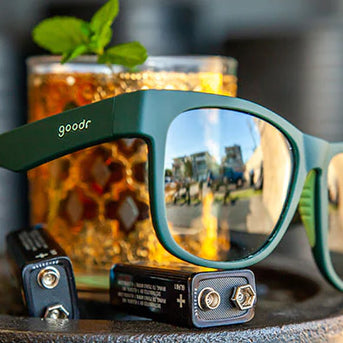 Mint Julep Electroshocks by Goodr in dark green sunglasses with reflective lenses, ideal for workout rehab and outdoor use