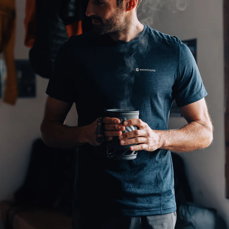 Dart T-Shirt - Men by Montane in dark blue, technical recycled fabric with warmth, breathability, and wicking for all-mountain use