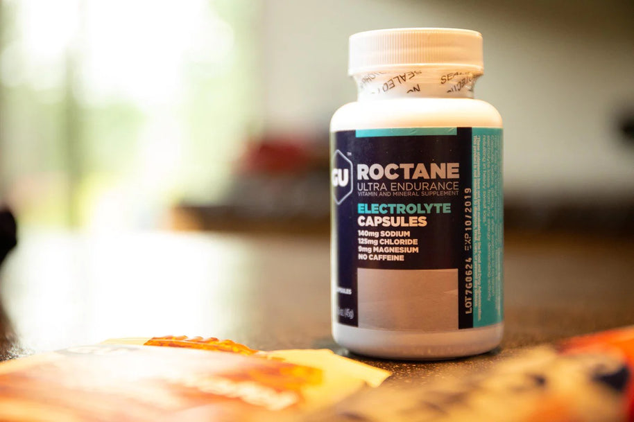 Roctane Electolyte Capsules by GU Energy in white bottle, hydration supplement with sodium, chloride, magnesium, ideal for endurance and heat conditions