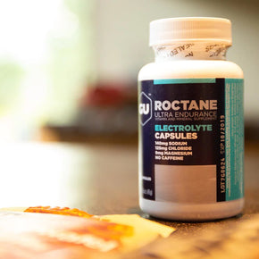 Roctane Electolyte Capsules by GU Energy in white bottle, hydration supplement with sodium, chloride, magnesium, ideal for endurance and heat conditions