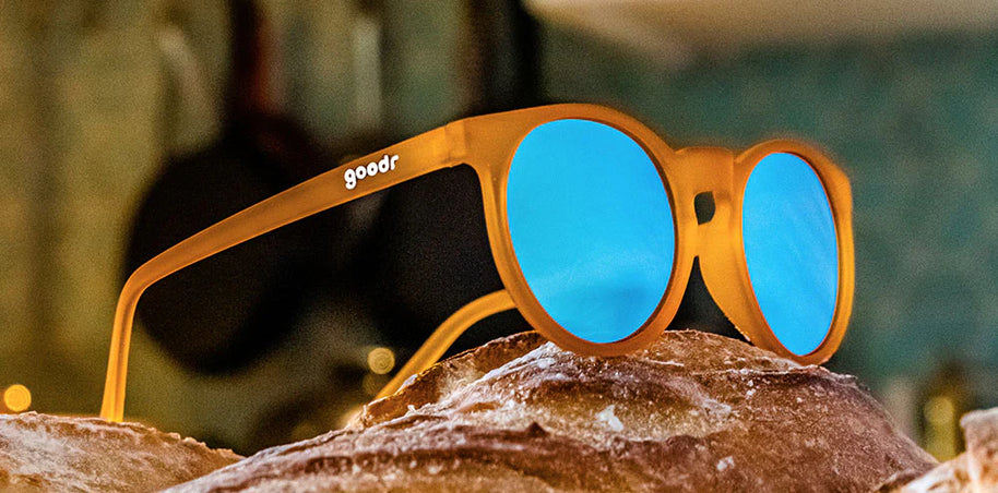 Freshly Baked Man Buns by Goodr, amber frame sunglasses with blue lenses, stylish USA-based glasses ideal for daily wear and outdoor activities