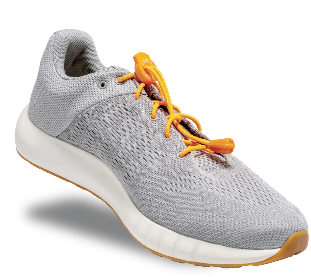 Lock Laces - No Tie Shoelaces in orange on grey sneaker by Lock Laces with double eyelet lock, easy install, one size fits all accessory for running store use
